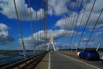 New suspension bridge of the Arade river (Rio Arade), Portimao, Algarve, Portugal.
Geometry of the white suspension cables for the N125 federal highway against the blue sky.