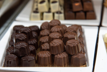A tempting assortment of gourmet chocolates on a decorative plate