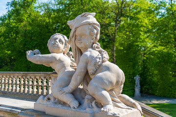 Obraz premium Sculptures in the gardens of Wilanow Palace. Historical Monuments. Warsaw