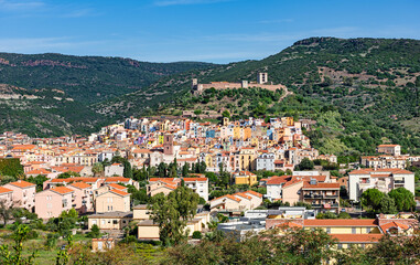 Panoramic view of the historic old town of Bosa with its colorful houses, Sardinia, Italy
