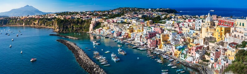 Italy travel and landmarks. Most scenic and colorful island - beautiful Procida in gulf of Naples. Port of Corricella panoramic view © Freesurf