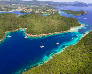 Obraz premium Epirus, Greece. Sivota - stunning aerial drone video of turquoise sea known as Blue Lagoon and unique beaches