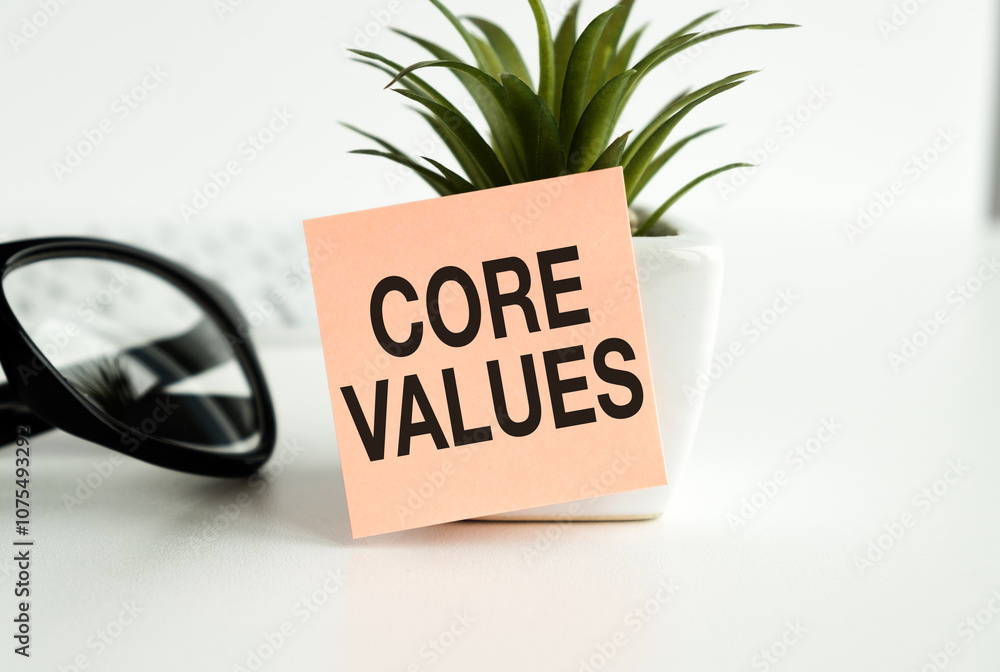 Poster the core values text on colored sticky notes next to the light bulb icon, copy space