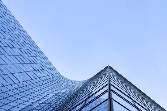 A Stunning Modern Architectural Marvel Featuring a Sleek and Striking Glass Facade