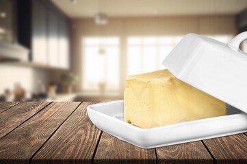 Fresh butter placed on plate. Breakfast time