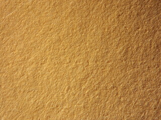 The textured surface is brown, red in color as a background. Felt. High quality photo