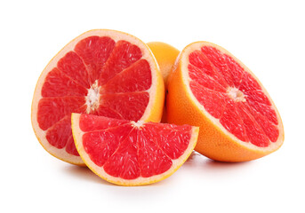 Cut fresh grapefruits on white background