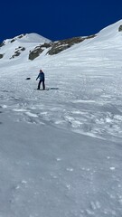 skiing in the mountains