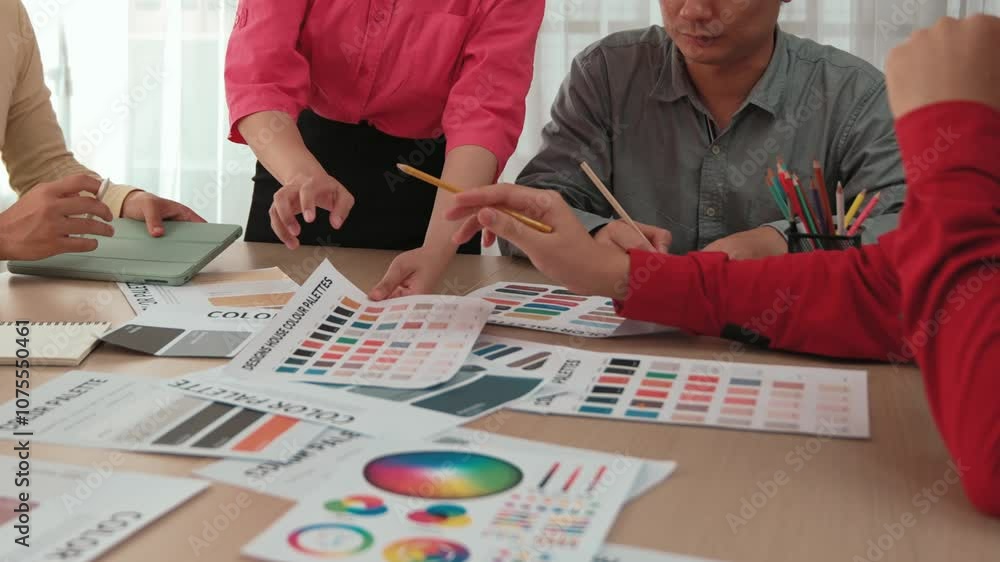Poster slow motion designer team brainstorming and choosing color for graphic design working or client aski