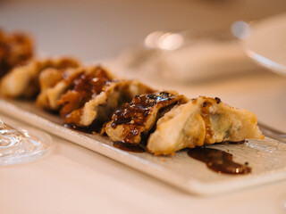 a plate of gyozas