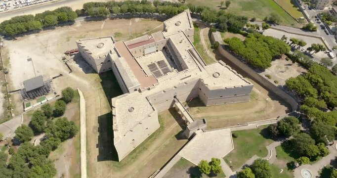 Aerial view of the castle located in Barletta, Puglia, Italy. It was a medieval fortress built for defense and today it is a museum. There is a park around the fort.