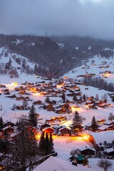 Grindelwald, under the soft glow of the night lights, transforms into a magical village where the...