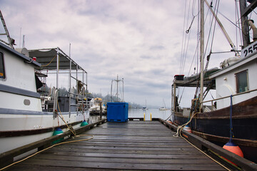 Fishing boat in the dock whit is fishing gear on board. 