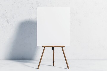 Blank Canvas on Wooden Easel Against Textured White Background for Creative Projects, Art Presentations, and Minimalist Designs in Studio Environment
