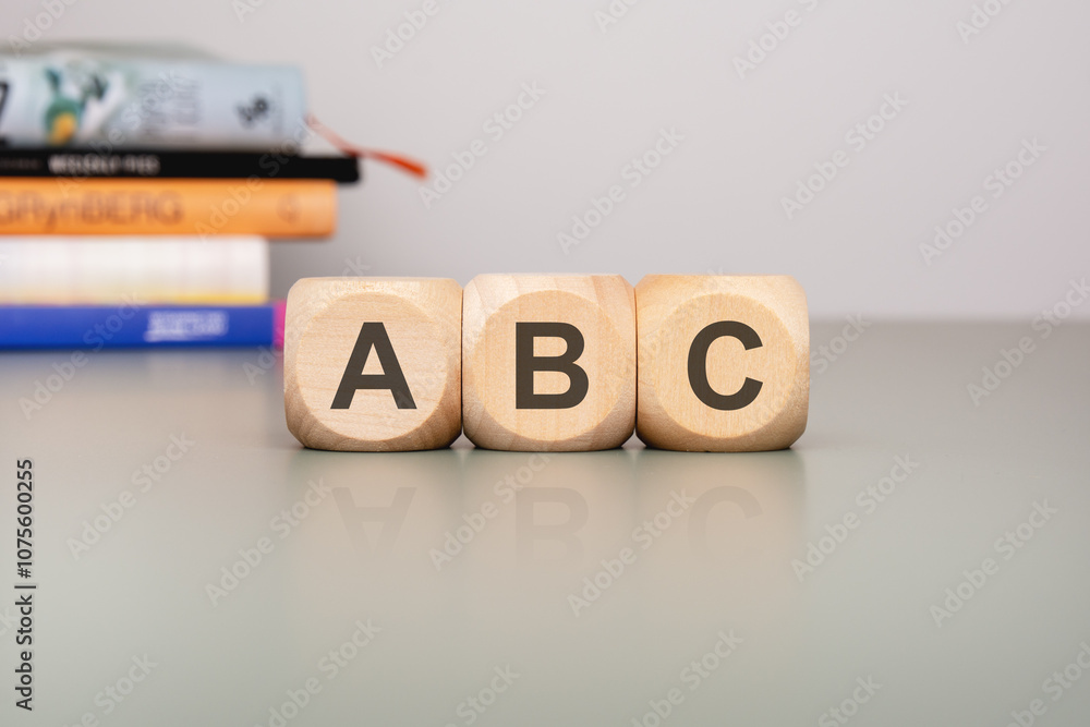 Poster childrens learning blocks featuring abc letters arranged neatly on a table surface