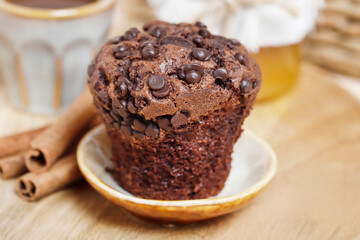 Chocolate muffin on small plate