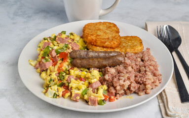 scramble eggs  with  corn beef hash and  sausages