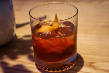 Whiskey Cocktail with Ice and Lemon Twist