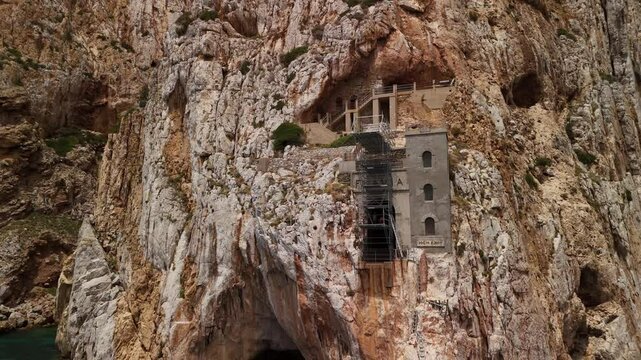 Exploring Porto Flavia in Sardinia: A historical mining site perched on rocky cliffs