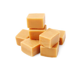 Tasty sweet caramel candies isolated on white
