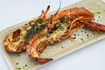 A grilled lobster cut in half