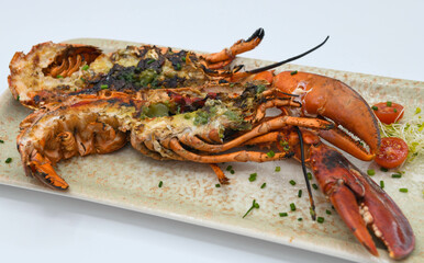 A grilled lobster cut in half