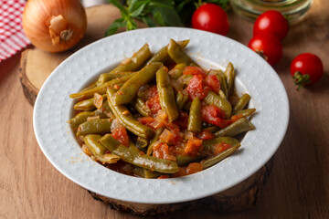 Traditional delicious Turkish food; Green beans with olive oil; Turkish name; Zeytinyagli taze fasulye
