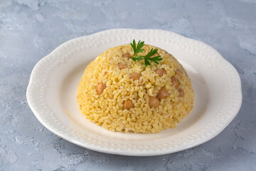 Traditional delicious Turkish food; bulgur pilaf with chickpea (Turkish name; nohutlu bulgur pilavi)