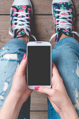 Young woman using smart phone