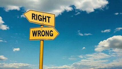 Two yellow road signs reading Right and Wrong point in opposite directions against a bright blue sky with white clouds