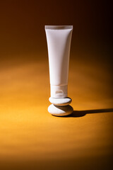 Empty white plastic tubes for cosmetics. Mockup. Packaging for cream, gel, serum, advertising and product promotion