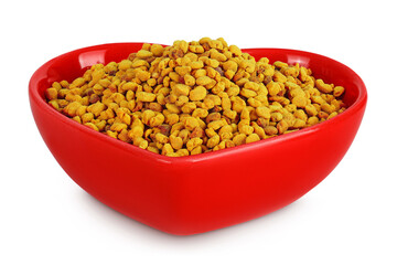 Bee pollen grains in ceramic bowl isolated on white background