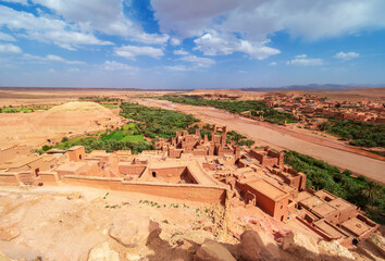 View of Ait Benhaddou in Ouarzazate, Morocco: Ancient Ksar Amidst Verdant Oasis and Desert, Gateway to the Sahara and Atlas Mountain