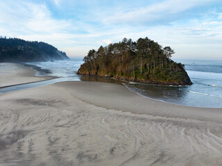 Proposal Rock stands on the scenic coast of central Oregon in Tillamook County. This part of the...