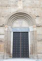 Pavia - The main Romanesque portal of church Basilica di San Michaele Maggiore