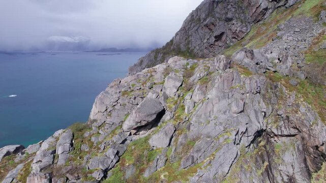 flying on the top of the mountains on the lofoten islands in norway, D-Log for better color grading