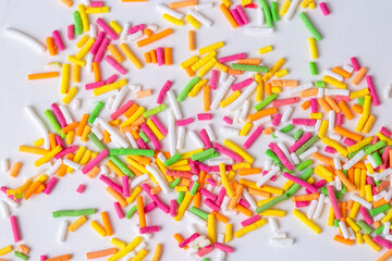 Sugar sprinkle dots, decoration for cake and bakery, a lot of sprinkles, isolated on white background