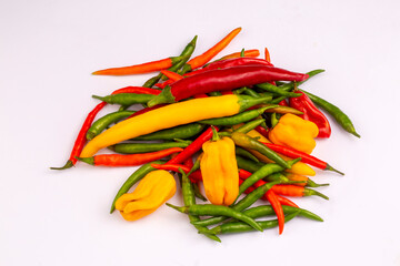 Colorful peppers on the white background