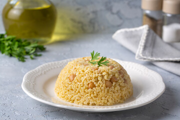 Traditional delicious Turkish food; bulgur pilaf with chickpea (Turkish name; nohutlu bulgur pilavi)