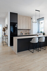  Modern dining room with table, chairs, kitchen and wooden floor. Design and minimalist furniture in new apartment with window, Real estate. Nobody.