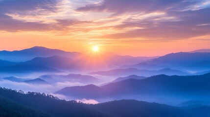 Obraz premium Majestic Himalayan Sunrise, a breathtaking view where vibrant colors light up towering peaks, enveloped by soft, low-hanging clouds creating depth and serenity.