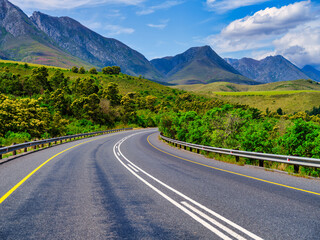 Rural Swellendam winding road with Langeberg Mountains in the background, Western Cape, South Africa
