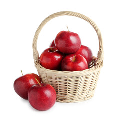 Fresh ripe red apples in wicker basket isolated on white
