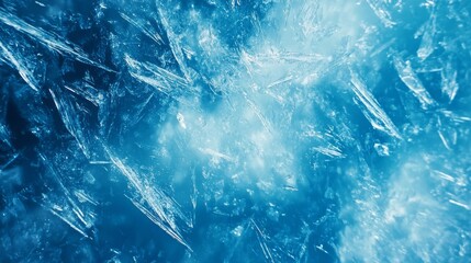 A truly mesmerizing closeup of frosty blue ice crystals that showcases a wonderfully textured surface brimming with the enchanting beauty and intricate cold patterns of winters embrace