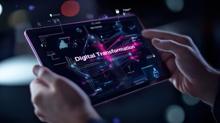 Fototapeta premium Hands Holding Tablet with Digital Transformation Concept and Futuristic Interface Elements in a Dark Setting