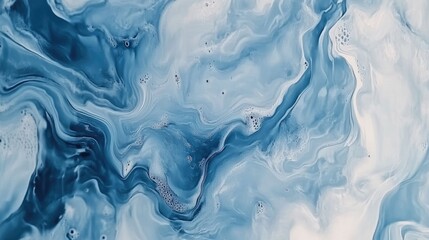 Obraz premium An abstract fluid art painting featuring swirling shades of blue and white creating a marble-like texture