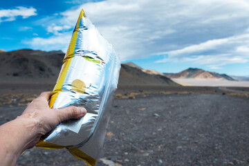 effect of altitude pressure on a bag of potato chips 5000 meters above sea level