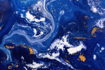 Abstract texture made from acrylic paint. Purple, red, black, and gold mixed colors