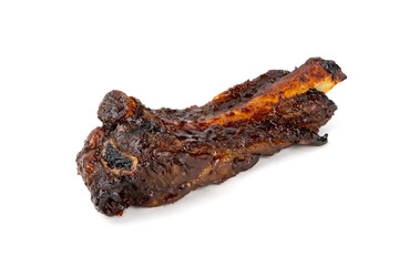A big juicy smoked meaty BBQ beef rib on an angle isolated on white