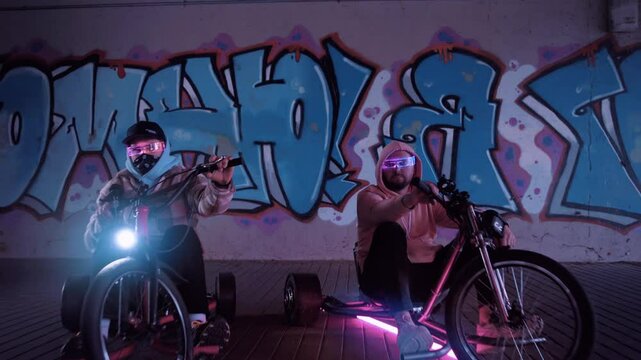 Experience an exciting night ride on colorful electric hoverboards in an urban setting